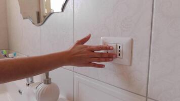 Woman Finger Turning Lightswitch On video