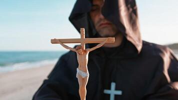 Monk Holding A Crucifix Praying video