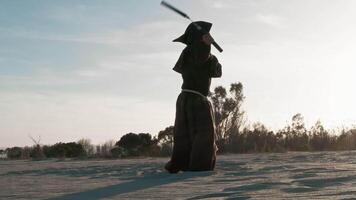 Franciscan father rotates nunchucks in the air video
