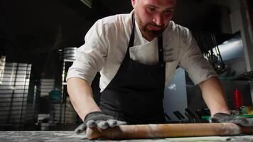 The Effort Of A Chef Using The Rolling Pin video