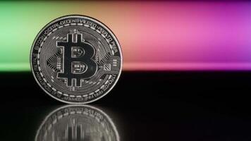 Silver Bitcoin On A Rainbow Background With Copy Space video