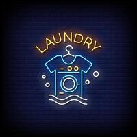 laundry neon Sign on brick wall background vector