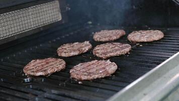 cooking beefsteak on the grill barbecue Grilled cutlets Hamburgers on the BBQ Grill video