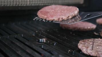 cooking beefsteak on the grill barbecue Grilled cutlets Hamburgers on the BBQ Grill video