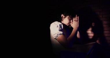 Woman Praying In An Isolated Dark Room video