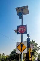 a set of double track railway crossing signs in Indonesia photo