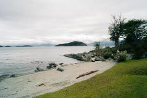 lake in Bahia Lapataia amidst mountains at Tierra del Fuego photo