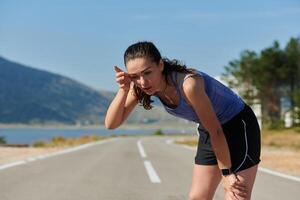 Close-Up Portrait of Determined Athlete Resting After Intense Workout photo