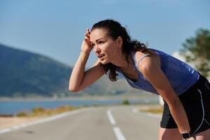 Close-Up Portrait of Determined Athlete Resting After Intense Workout photo