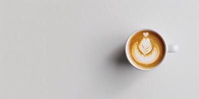 Photo of coffee cup from above with beautiful pattern. White background