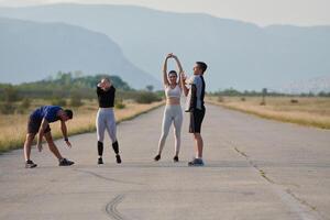 Diverse Group of Athletes Prepare Together for a Run photo