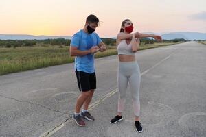 Diverse Athletic Warm-Up. Group Prepares for Intense Running Challenge. photo