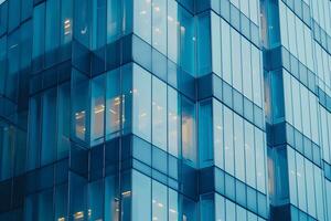 Low angle photo of a glass skyscraper.