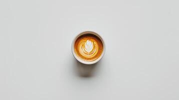 Photo of coffee cup from above with beautiful pattern. White background