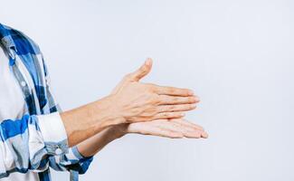 Hands gesturing STOP in sign language. Close up of hands gesturing STOP in sign language photo