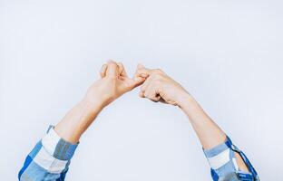 Friendship concept in sign language. Hands gesturing FRIENDSHIP symbol in sign language photo