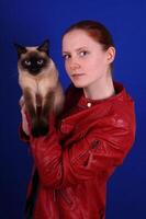 young woman with cat photo