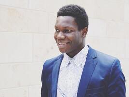 happy young man of african descent photo