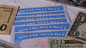 10 photo of stack of social security cards ssn on turn table