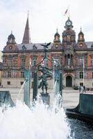 Facade of Malmo Town hall and fountain, Sweden photo