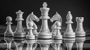 Chess pieces arranged strategically on a board photo