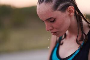 Close-Up Portrait of Determined Athlete Resting After Intense Workout photo