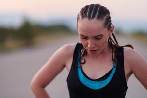 Close-Up Portrait of Determined Athlete Resting After Intense Workout photo