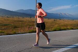 Determined Dawn. Confident and Motivated Athlete Embarks on Sunrise Run. photo