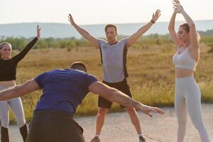 Diverse Group of Athletes Prepare Together for a Run photo