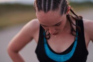 Close-Up Portrait of Determined Athlete Resting After Intense Workout photo