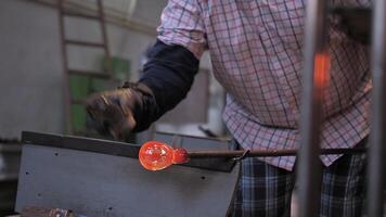 The process of making glass decor with glassblower video