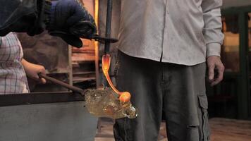 The process of making glass decor with glassblower video