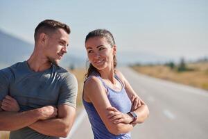 After-Run Relaxation. Romantic Couple Rests Following Intense Training Session. photo