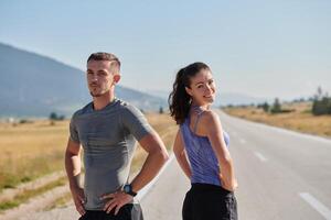 After-Run Relaxation. Romantic Couple Rests Following Intense Training Session. photo