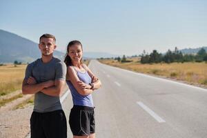 After-Run Relaxation. Romantic Couple Rests Following Intense Training Session. photo