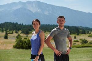 After-Run Relaxation. Romantic Couple Rests Following Intense Training Session. photo