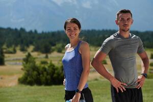 After-Run Relaxation. Romantic Couple Rests Following Intense Training Session. photo