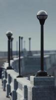 Row of Black and White Street Lights on Sidewalk video