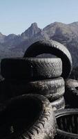 Old Tires Piled on Mountain Top video