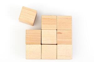 Wooden cubes on a white background photo