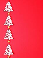 Christmas garland on a red background photo