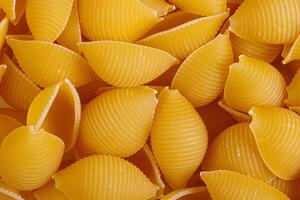 Pasta products in the form of a shell, texture photo