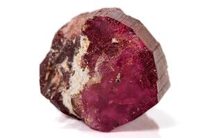 Macro red tourmaline mineral stone on white background photo