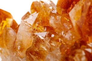 Macro mineral stone Citrine in rock in crystals on a white background photo