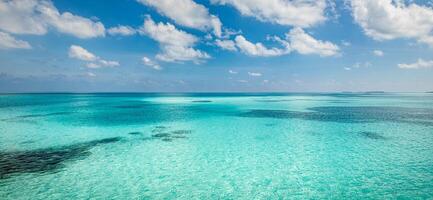 Relaxing seascape with wide horizon of the sky and the sea. Panorama of tropical beach seascape horizon. Abstract bright sunshine sky light tranquil relax summer seascape freedom wide angle photo