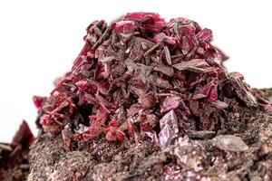 Macro stone Erythrite mineral on white background photo