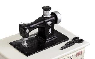 jewelry box with decorative sewing machine on a white background photo