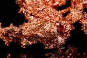 Macro mineral stone Copper on black background photo