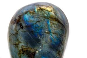 Macro mineral stone Labradorite on white background photo