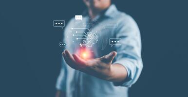 AI, artificial intelligence technology concept. Human or businessman use AI tech for connection to global business. Robot chat for business, data management by AI technology smart robot. photo